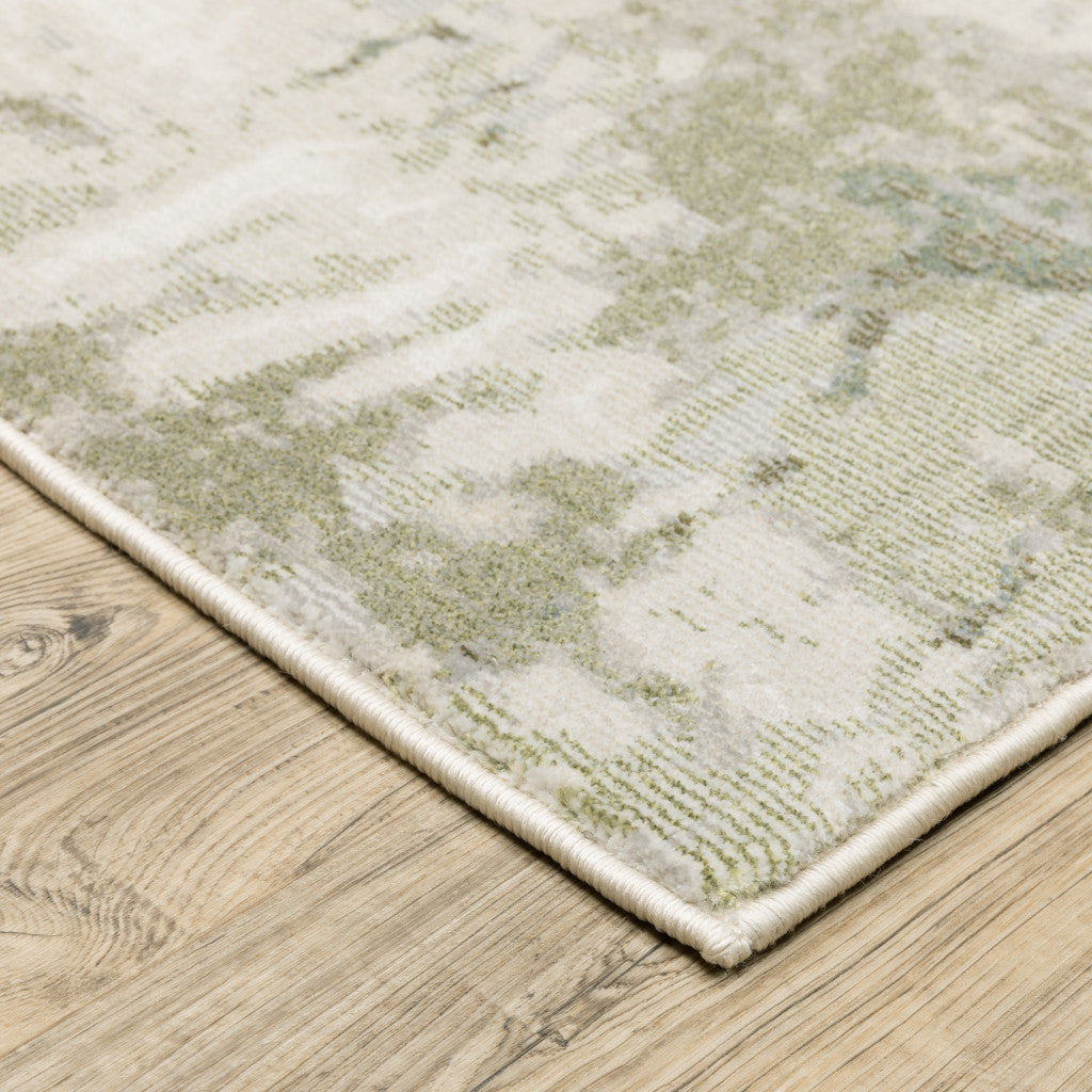 5' X 8' Beige And Green Abstract Distressed Area Rug