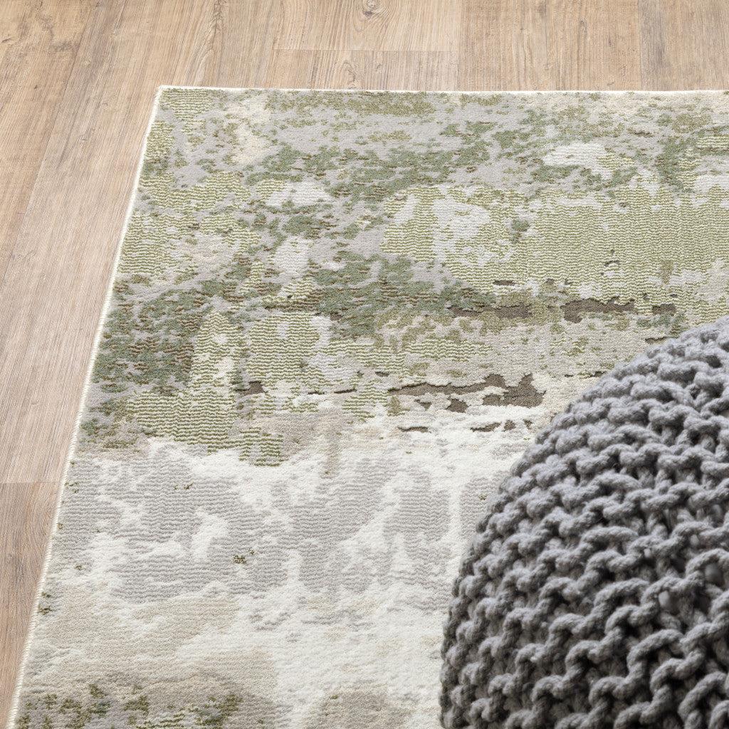 5' X 8' Beige And Green Abstract Distressed Area Rug