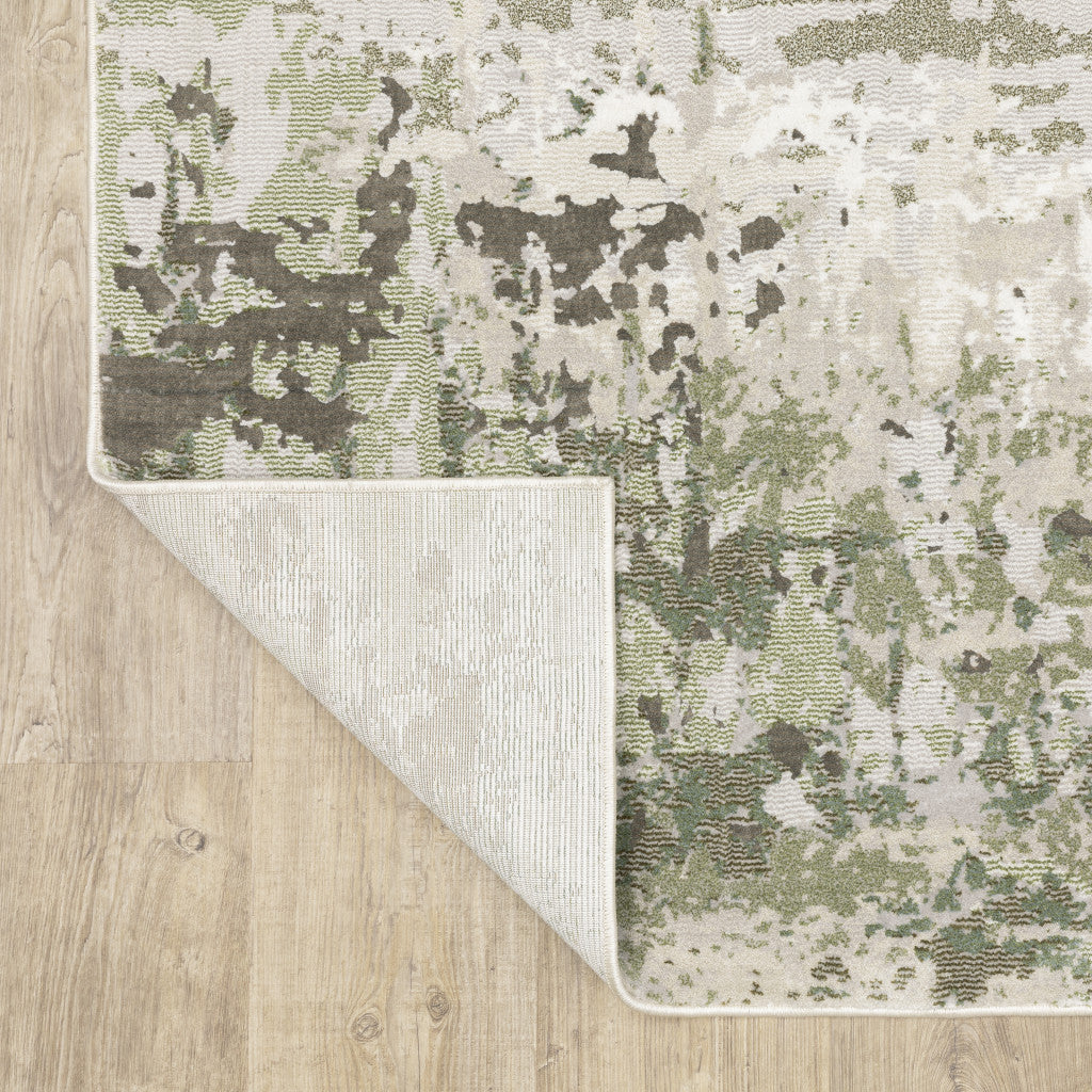 5' X 8' Beige And Green Abstract Distressed Area Rug