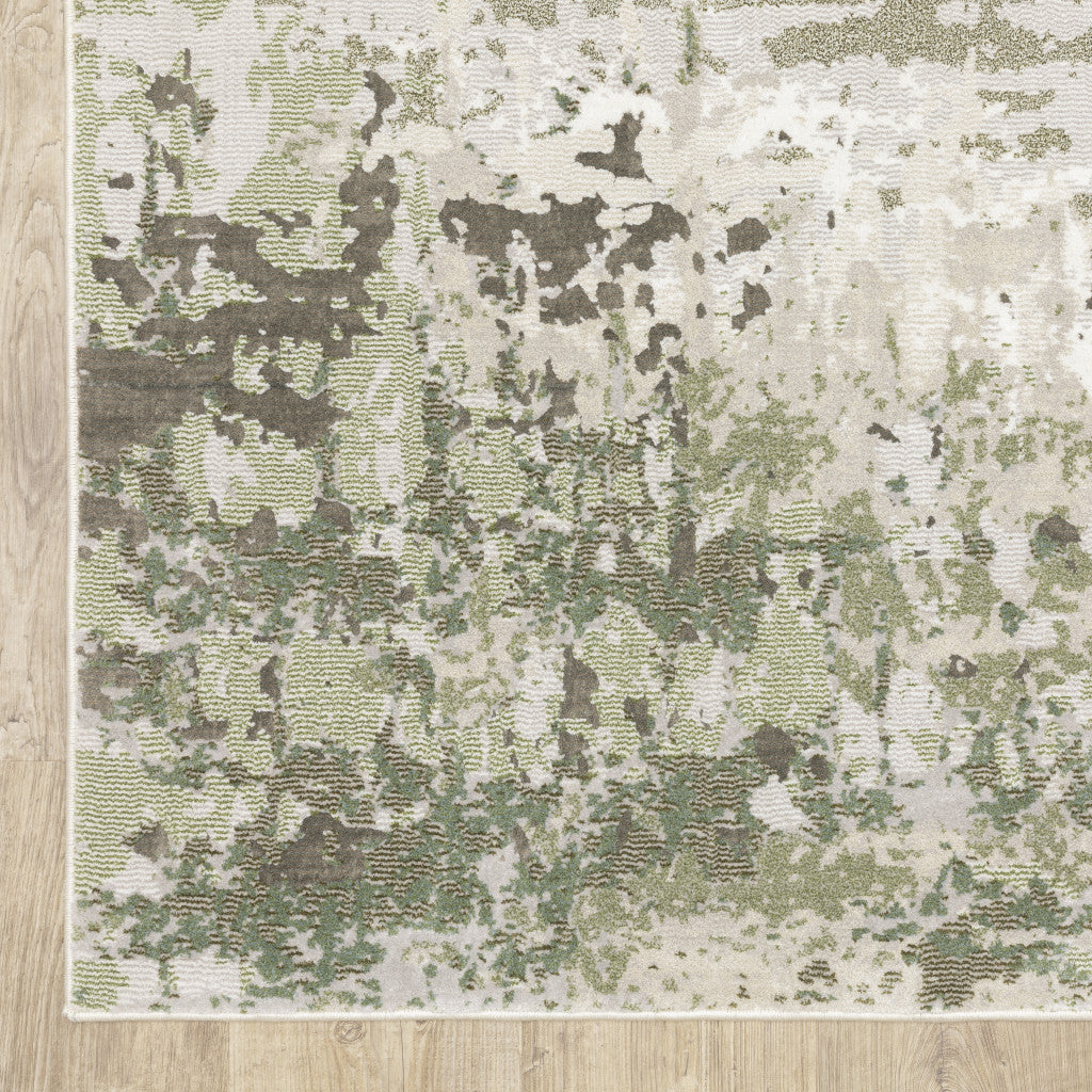 5' X 8' Beige And Green Abstract Distressed Area Rug